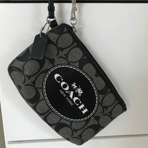 Medium sized coach wristlet